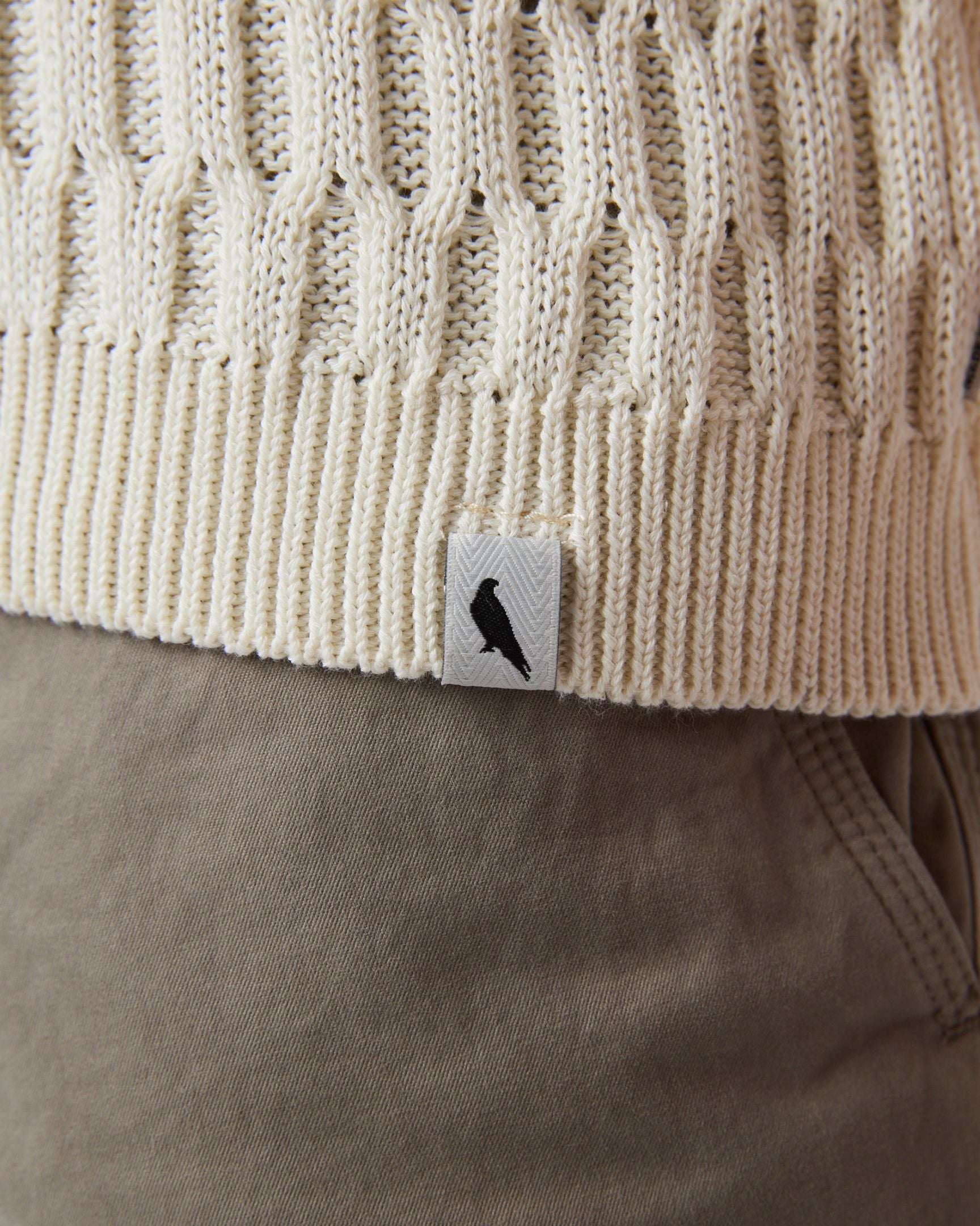 Image of model wearing Cove Polo Shirt. 