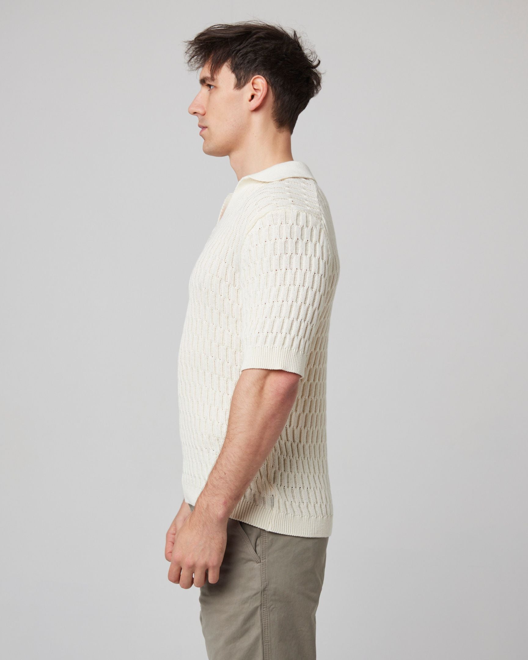 Image of model wearing Cove Polo Shirt. 