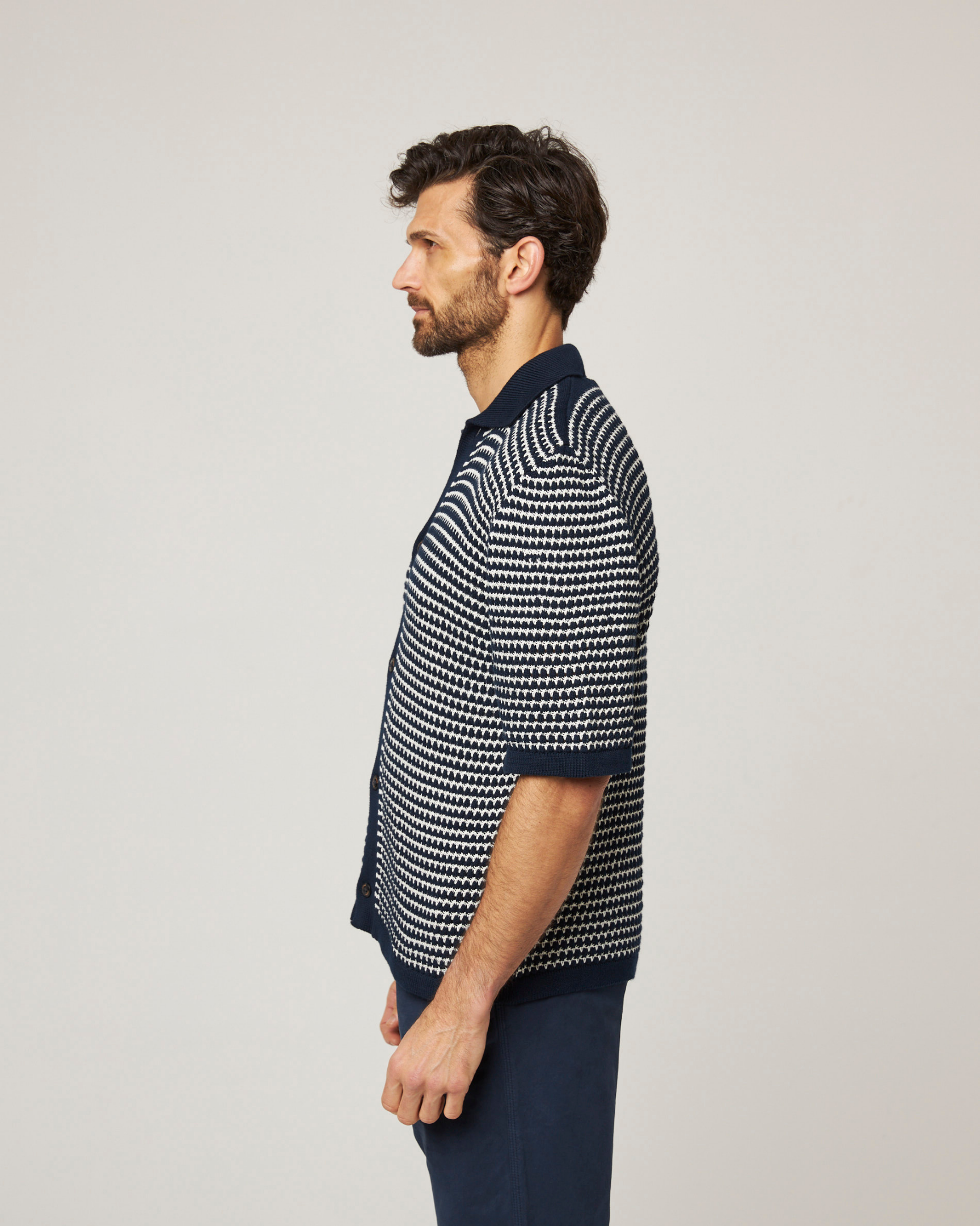 Image of model wearing Island Crochet Shirt. 