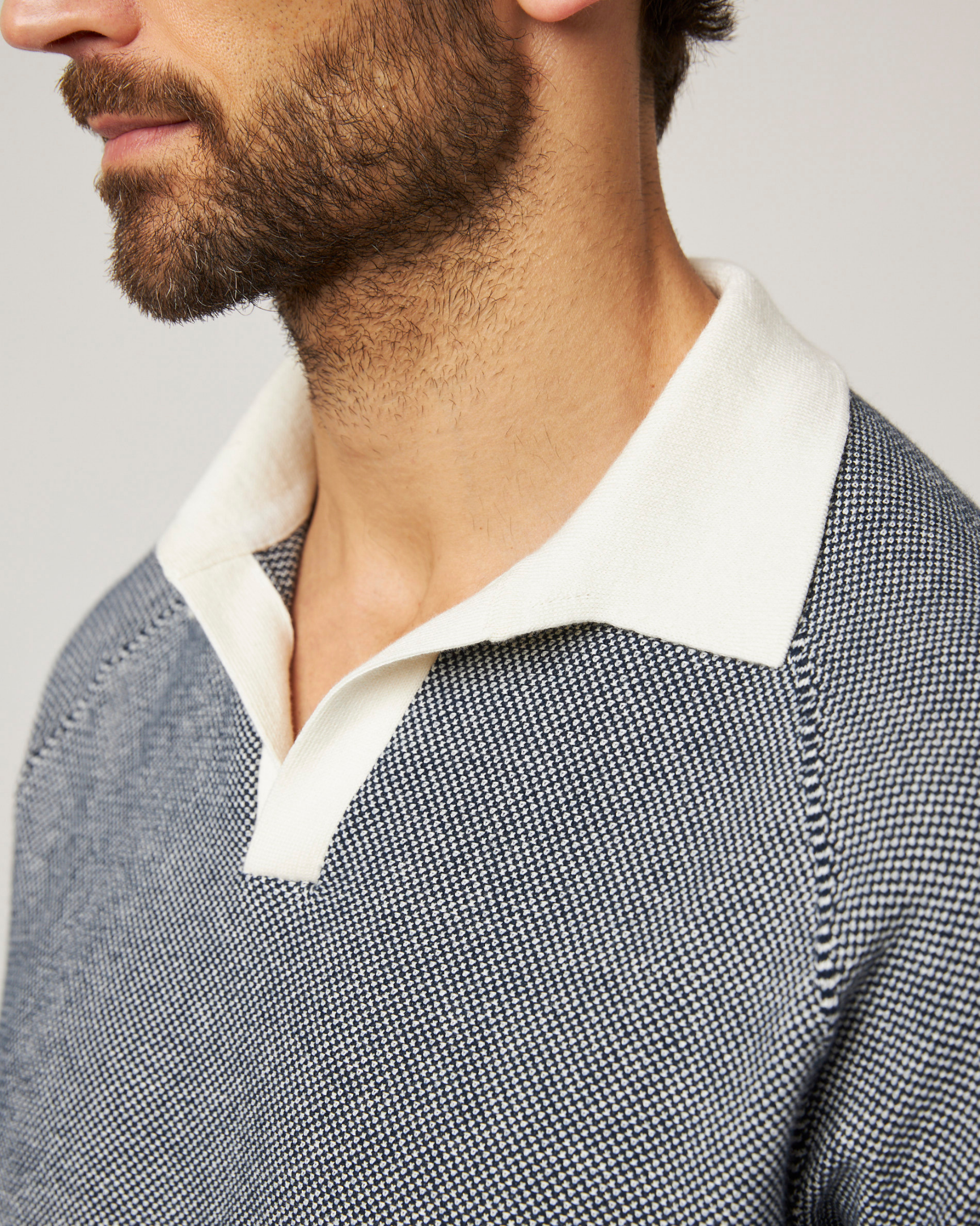 Image of model wearing Lynton Polo Shirt. 