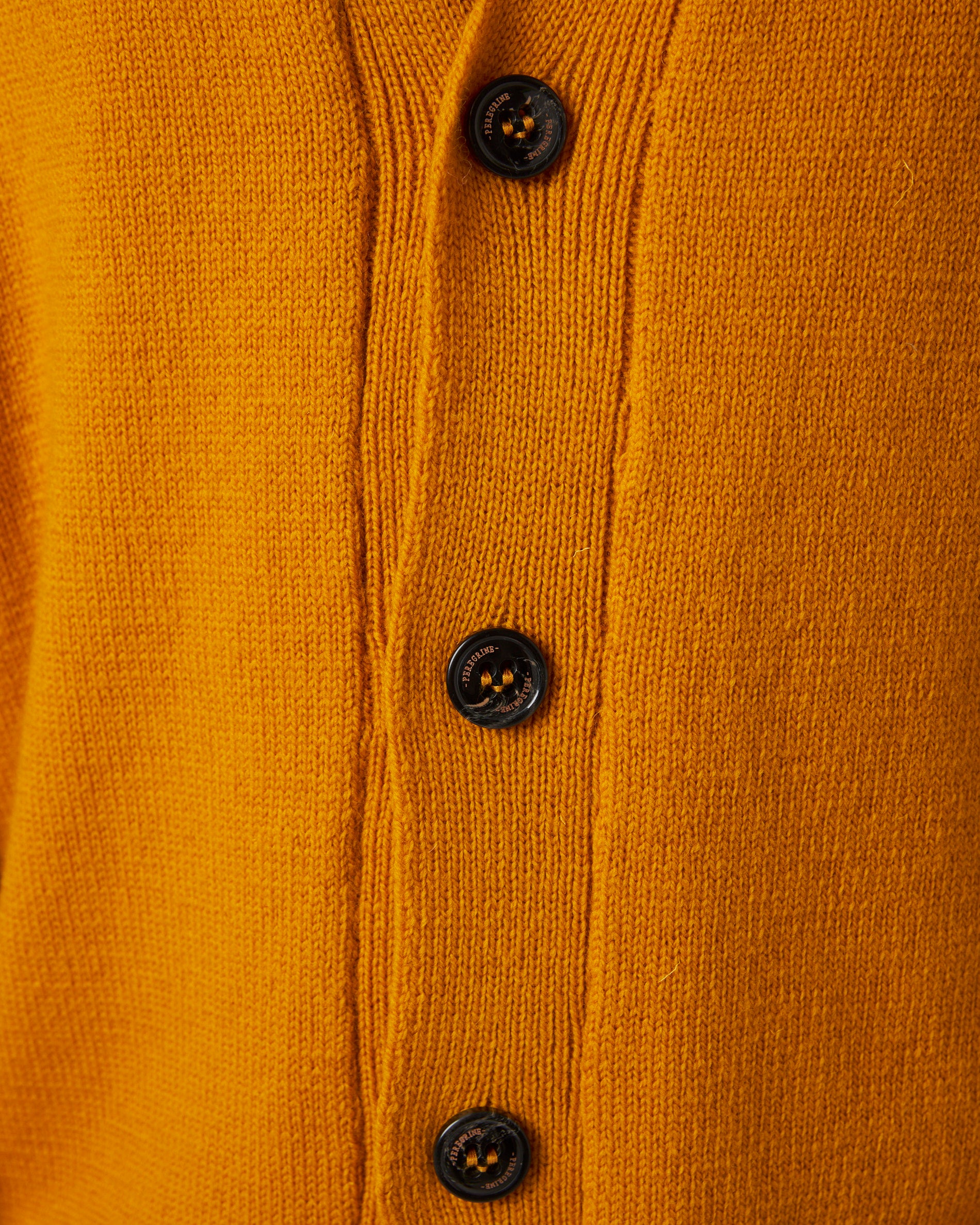 Image of model wearing Makers Cardigan. 