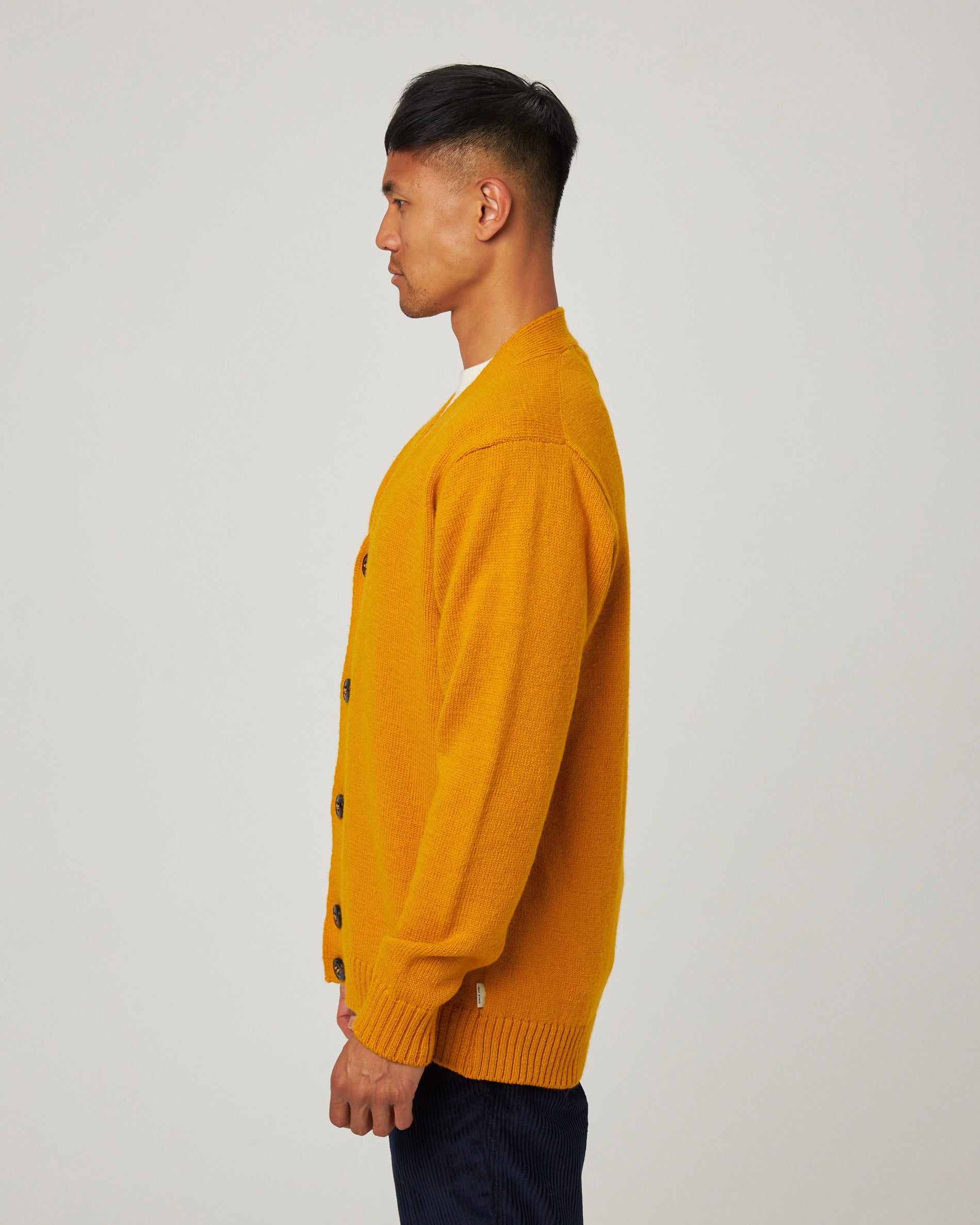 Image of model wearing Makers Cardigan. 