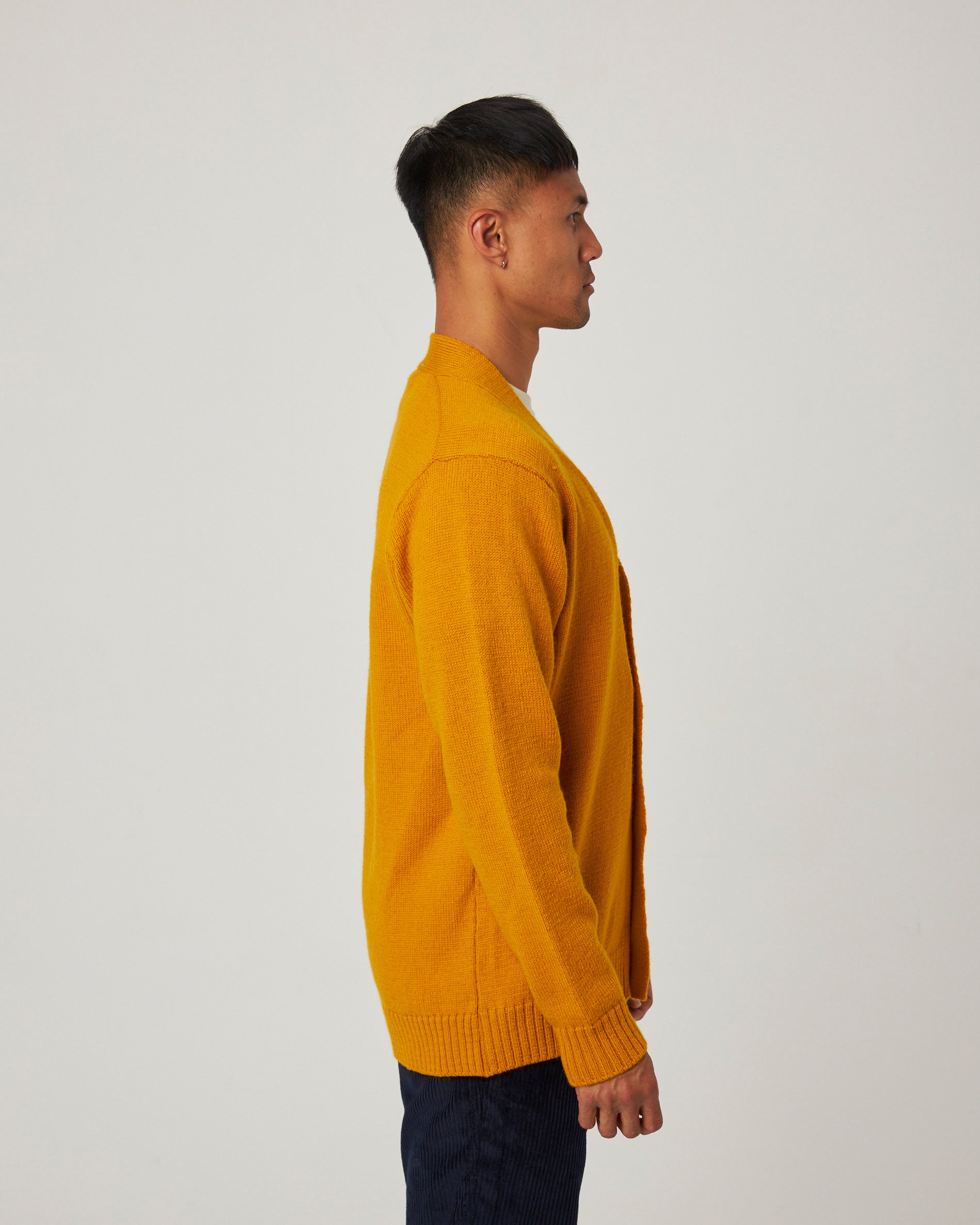 Image of model wearing Makers Cardigan. 