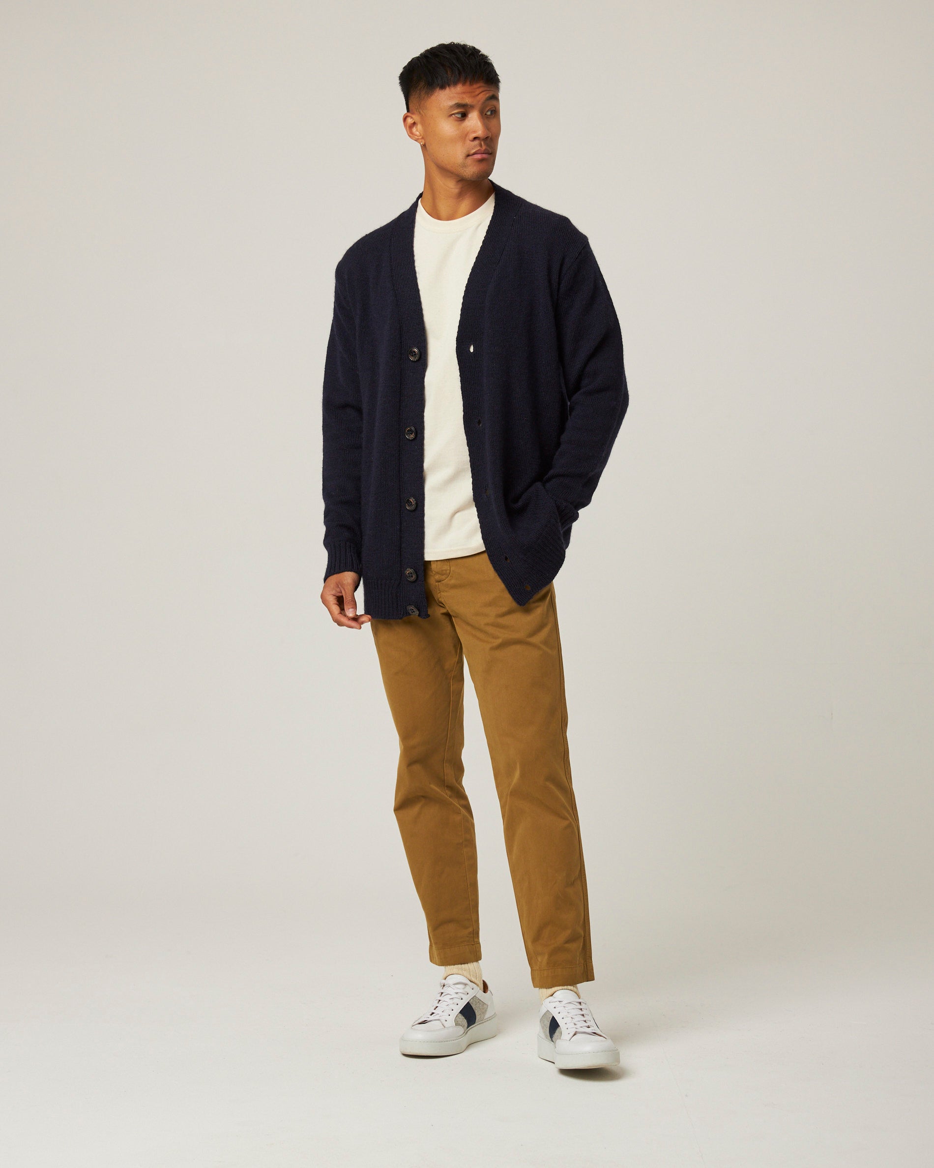 Image of model wearing Makers Stitch Cardigan. Model is 6ft1in, chest size 38in and wearing size Large