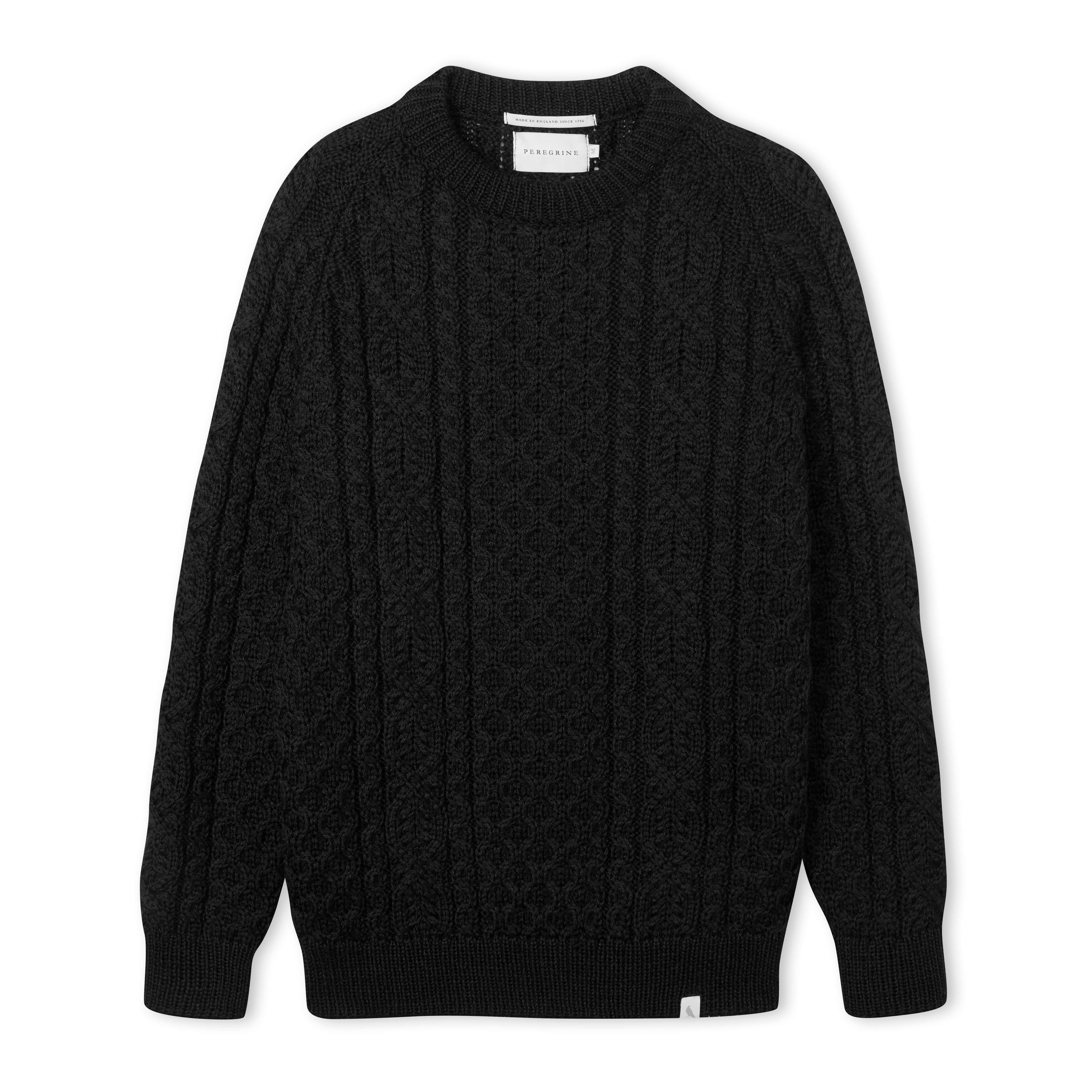Image of model wearing Hudson Aran Jumper. Model is 6ft1in, chest size 38in and wearing size Medium