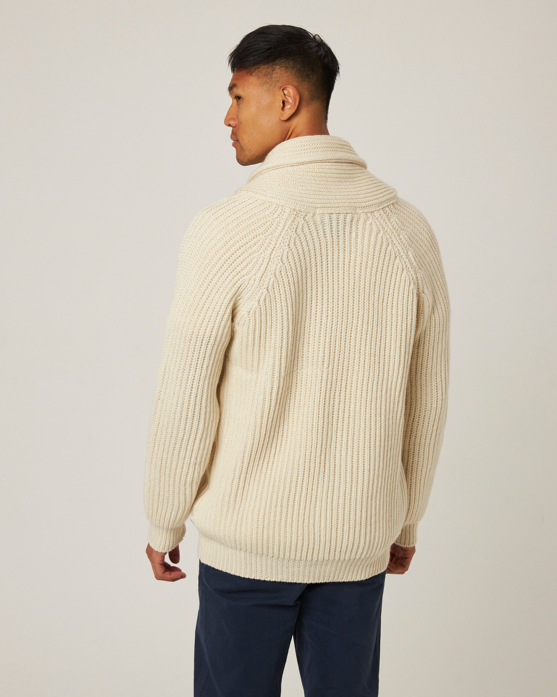 Image of model wearing Wilkinson Cardigan. Model is 6ft1in, chest size 38in and wearing size Large