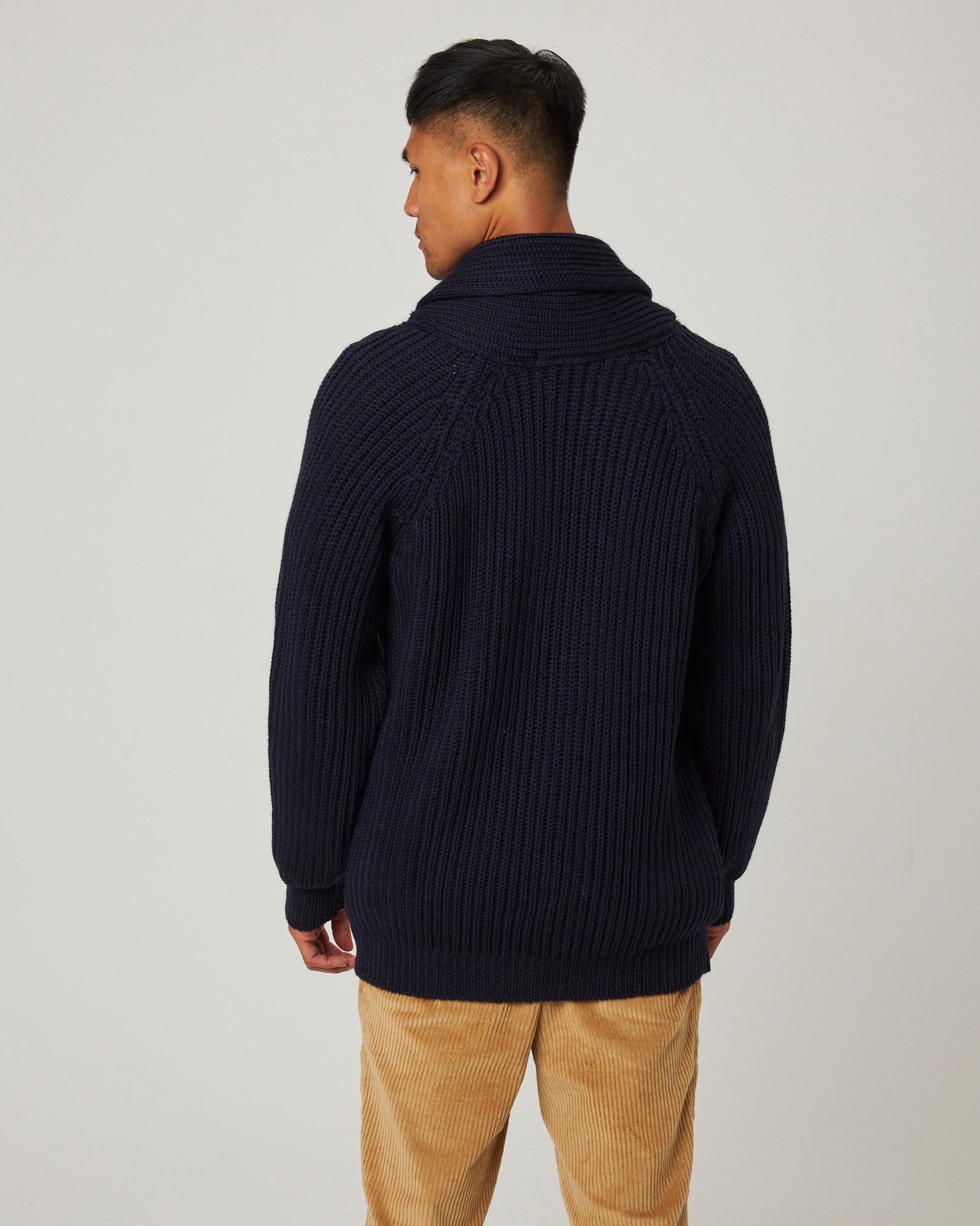 Image of model wearing Wilkinson Cardigan. Model is 6ft1in, chest size 38in and wearing size Large