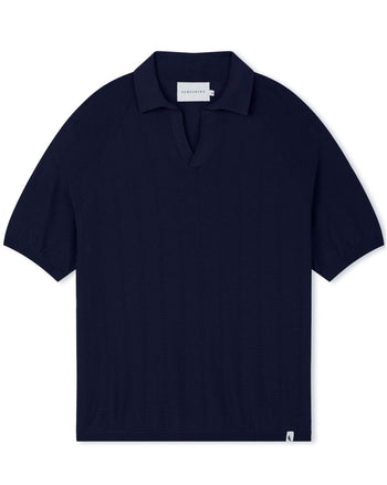 Image of model wearing Alma Polo shirt. 
