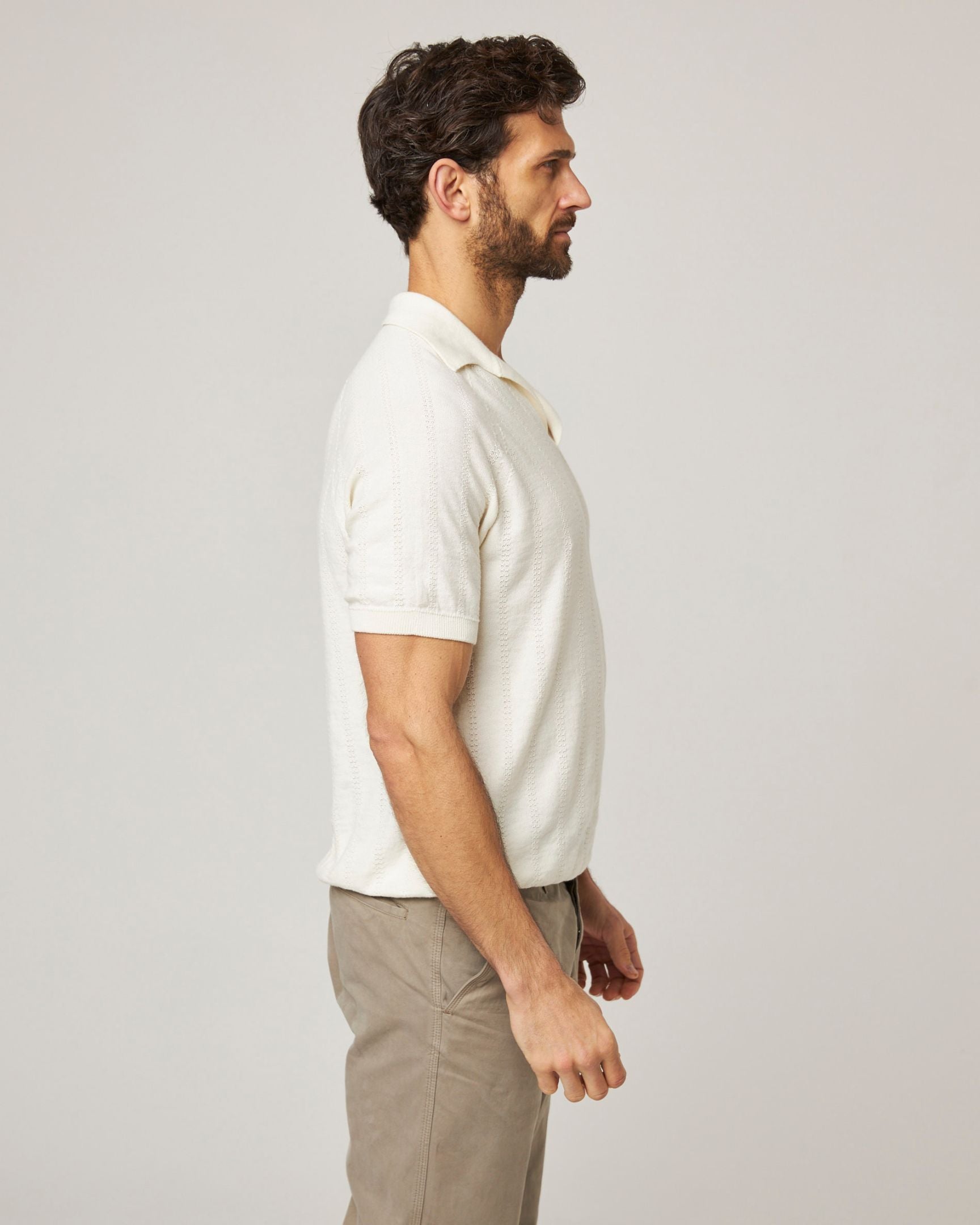 Image of model wearing Alma Polo shirt. 
