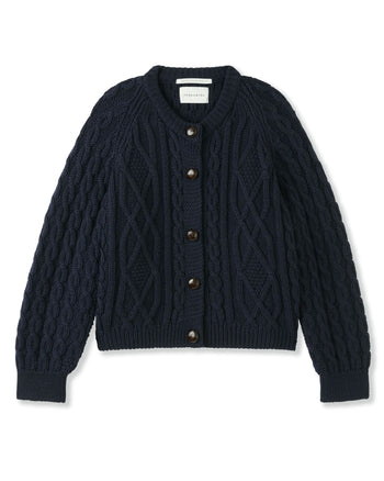 Image of model wearing Beckett Cable Knit Cardigan. 