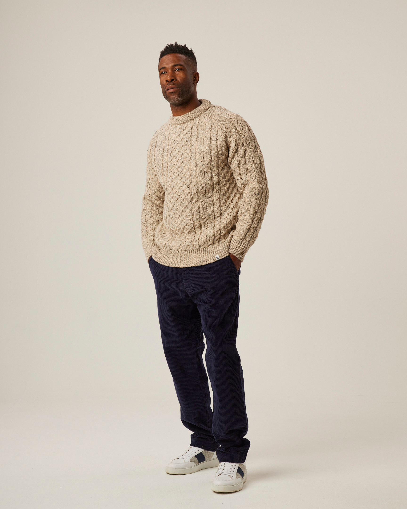 Image of model wearing Blake Corduroy Trousers. 