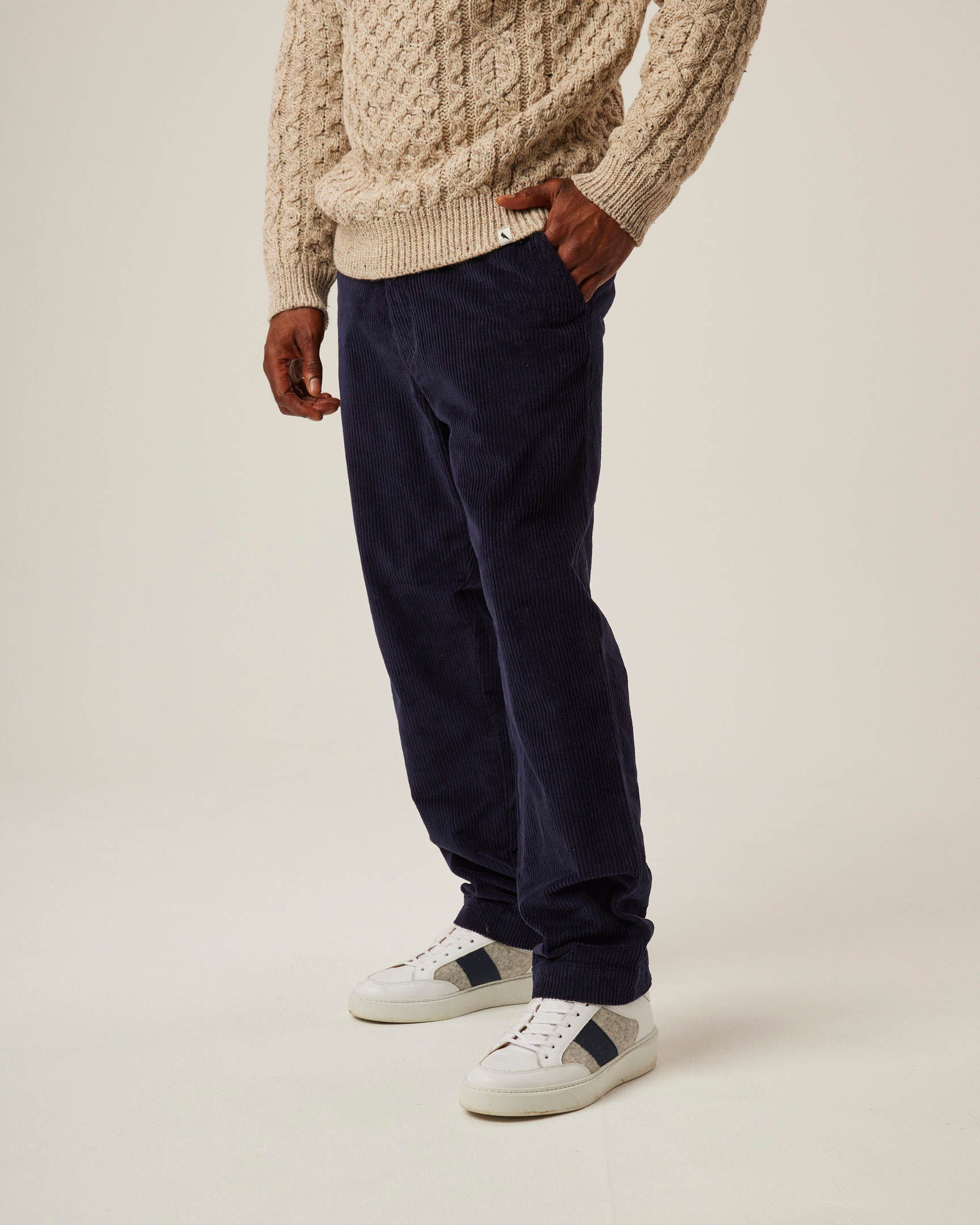 Image of model wearing Blake Corduroy Trousers. 