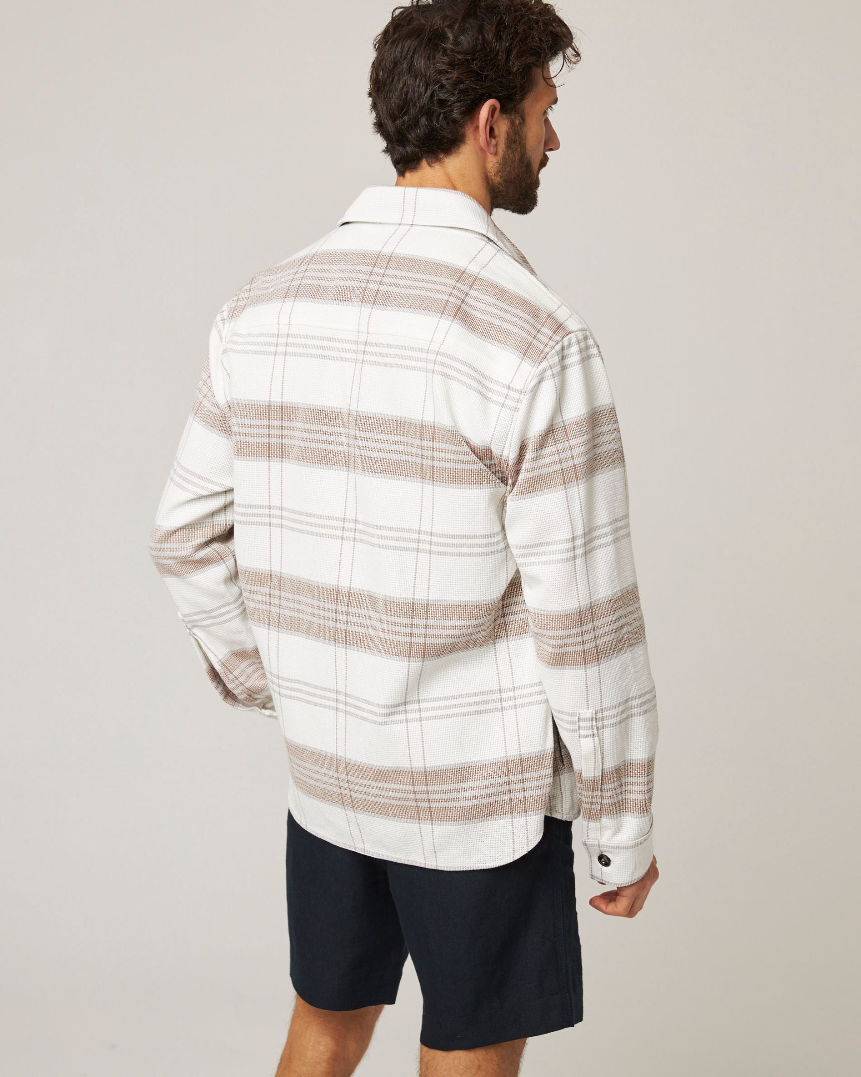 Image of model wearing Blunt Overshirt. 