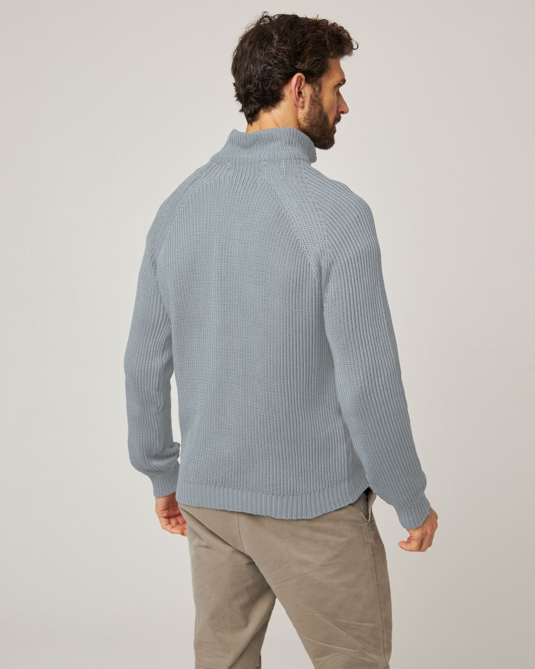 Image of model wearing Felix Quarter Zip Jumper. 