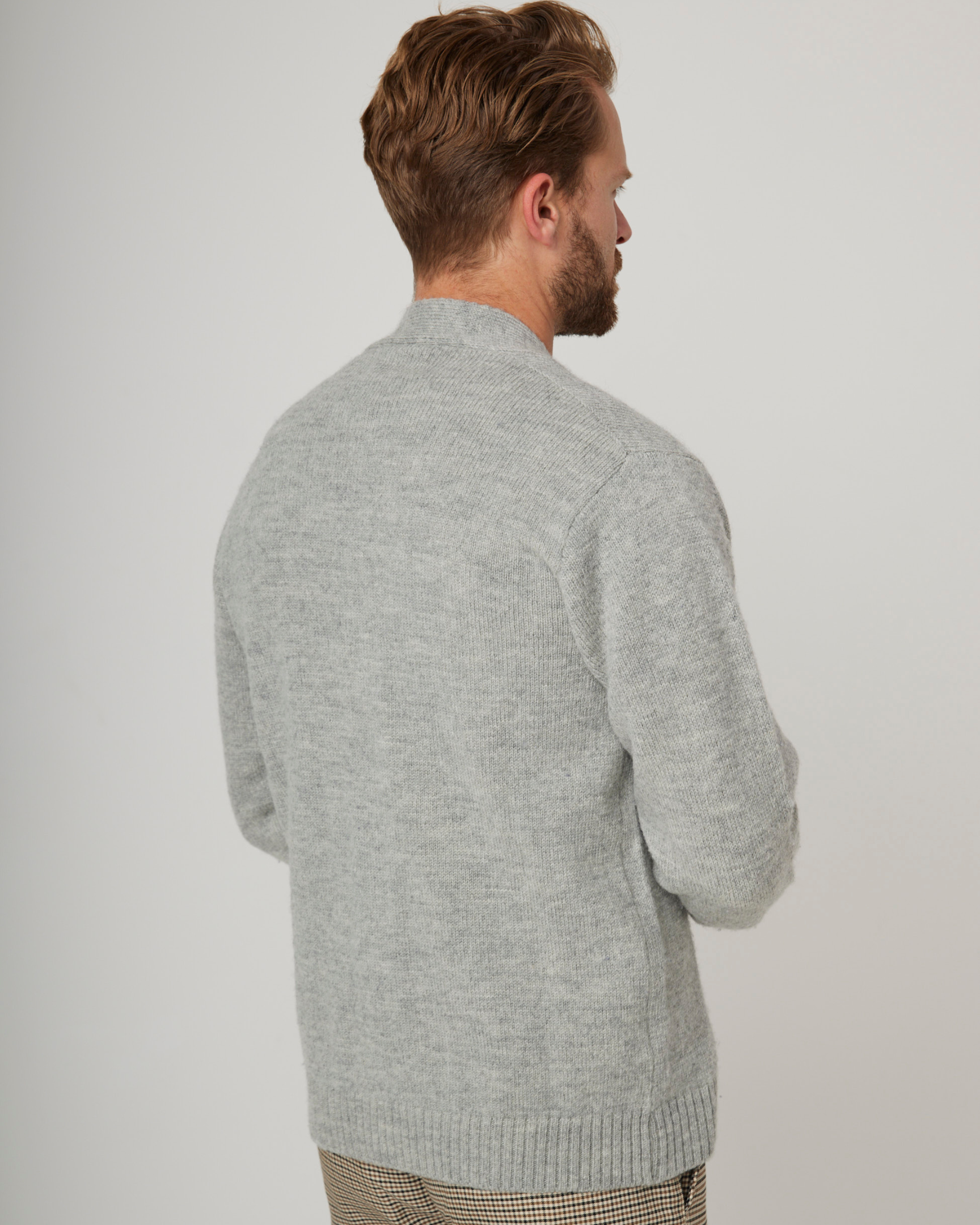 Image of model wearing Makers Cardigan. 